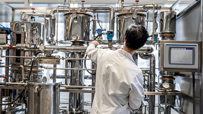 Worker in a chemical processing factory