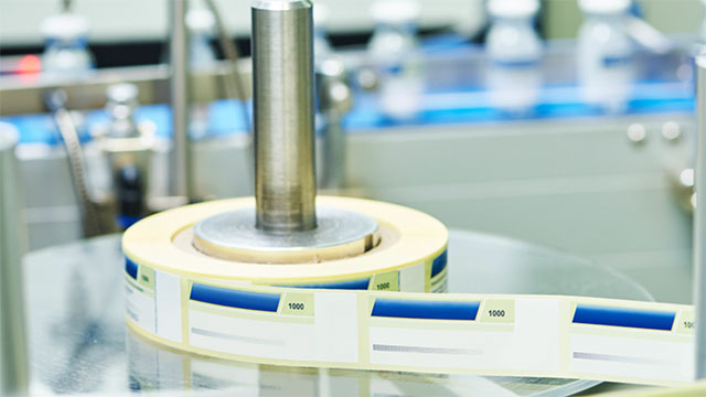 Blank Paper Labels on a Spool at a Medical Device Manufacturing Facility