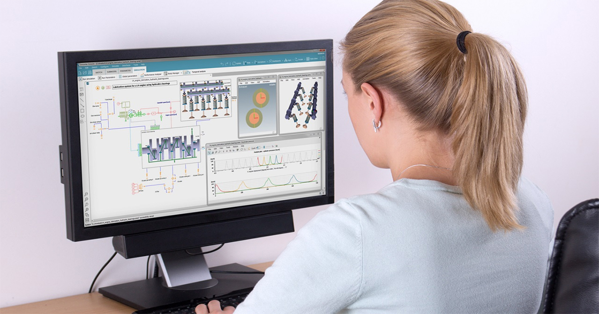 Machinery engineer on desktop using simcenter software simulation and testing tools