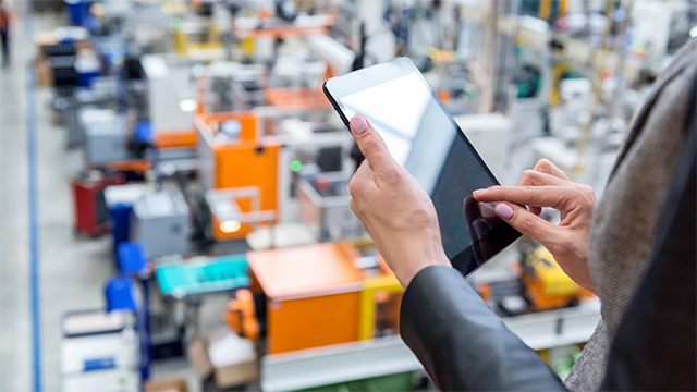 Person using software in a smart warehouse