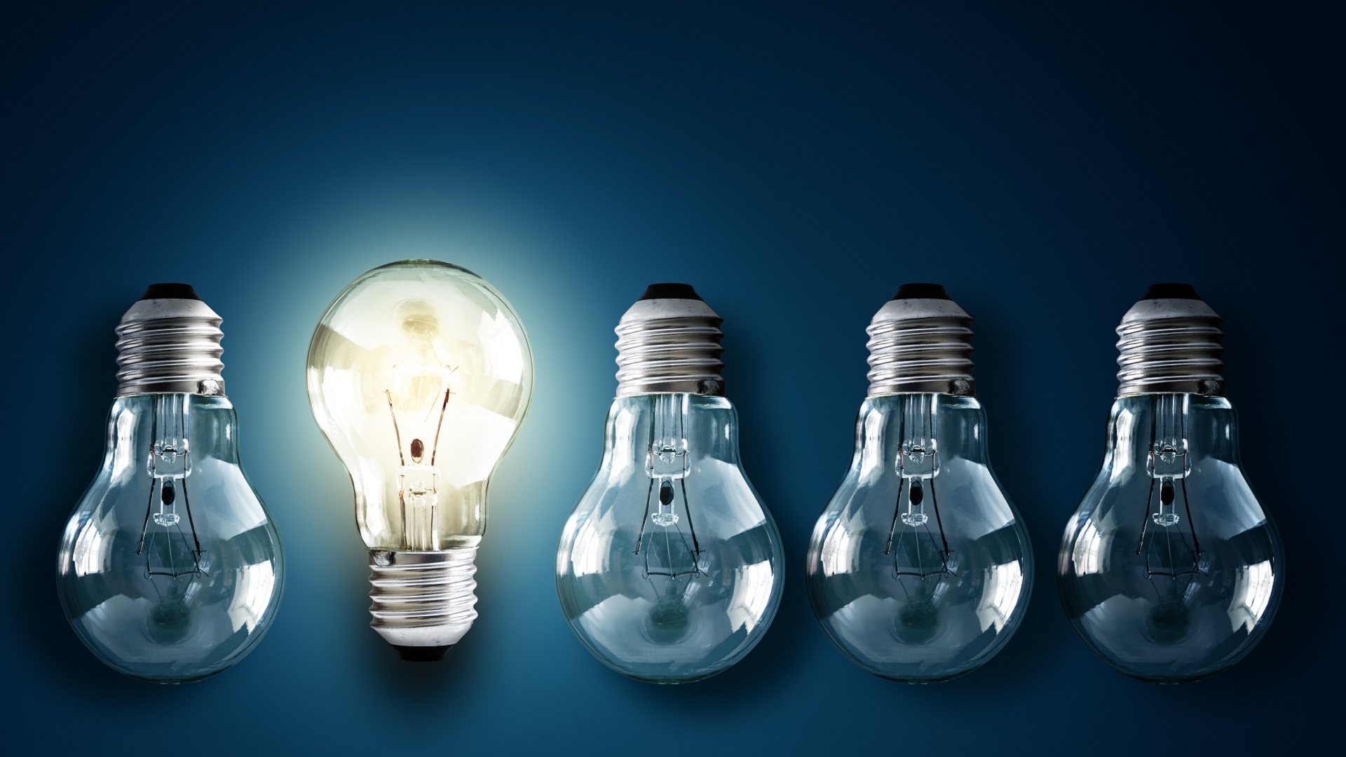 5 lightbulbs, 1 lit, representing multiple PLM tools for bright ideas and innovation