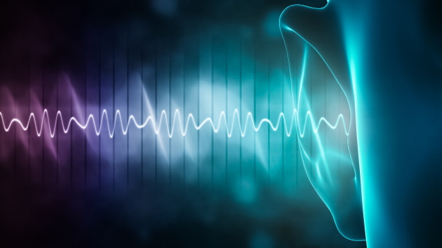 A human ear captures a sound. With active sound design, manufacturers shape the perceived sound. 