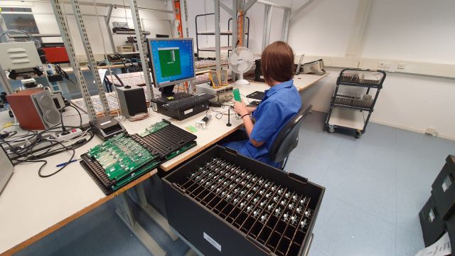 Photo of manual PCB process preparation that is error-prone and time-consuming