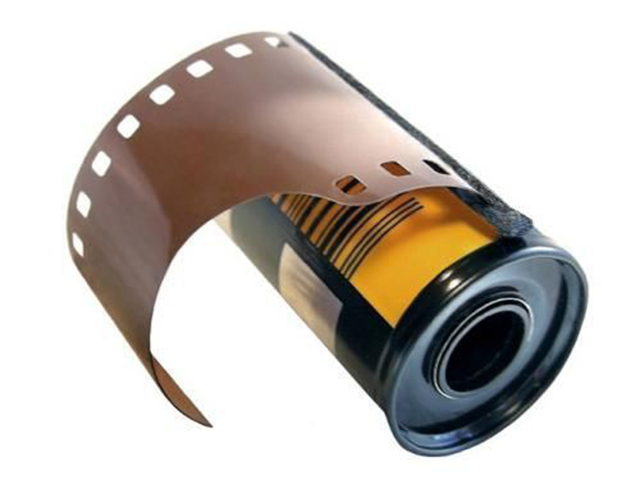 A roll of 35mm photo film. 