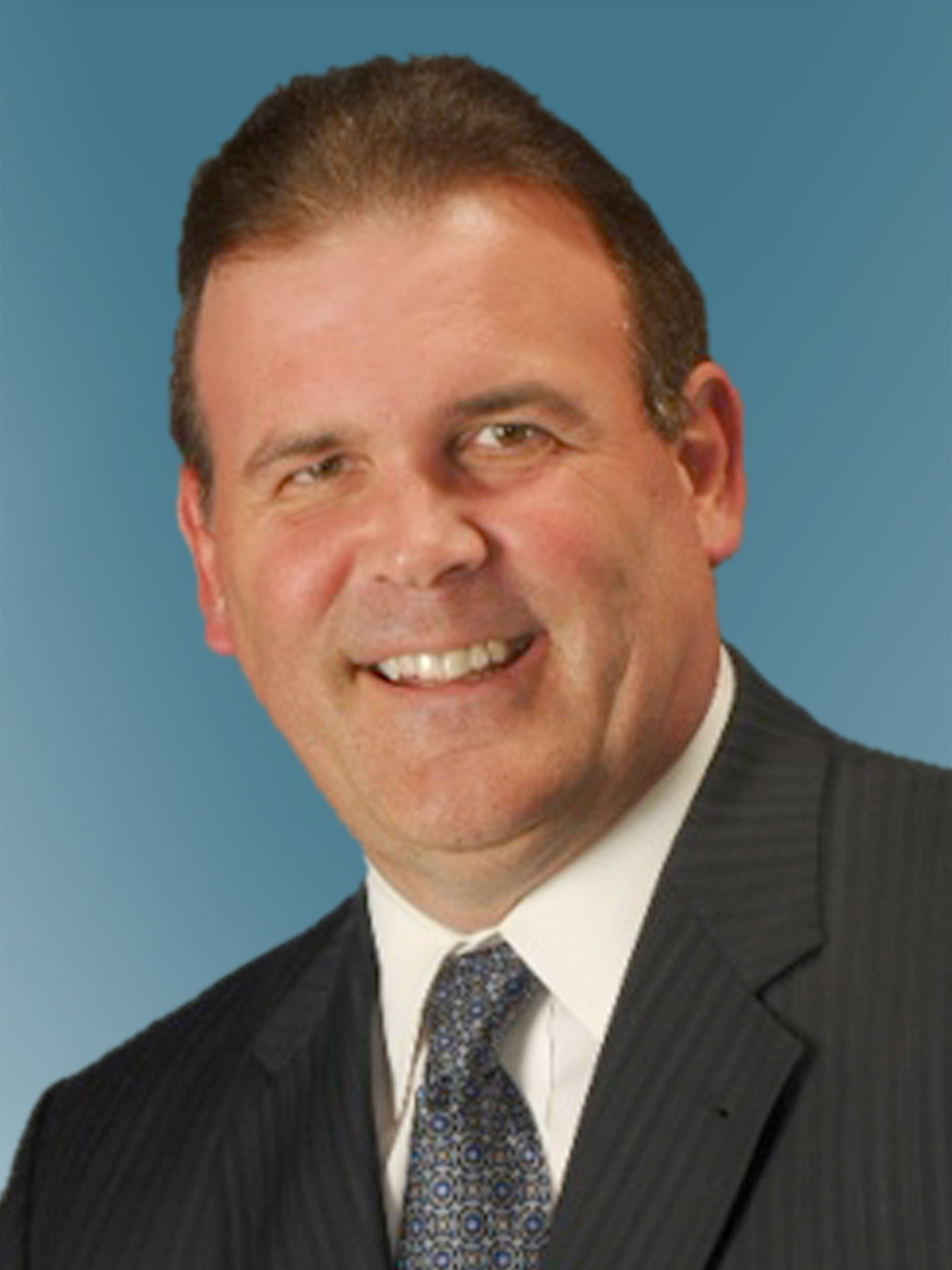 柯克·古特曼 (Kirk A. Gutmann)，行业战略部高级副总裁